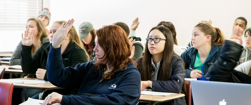 Sociology class with students asking questions